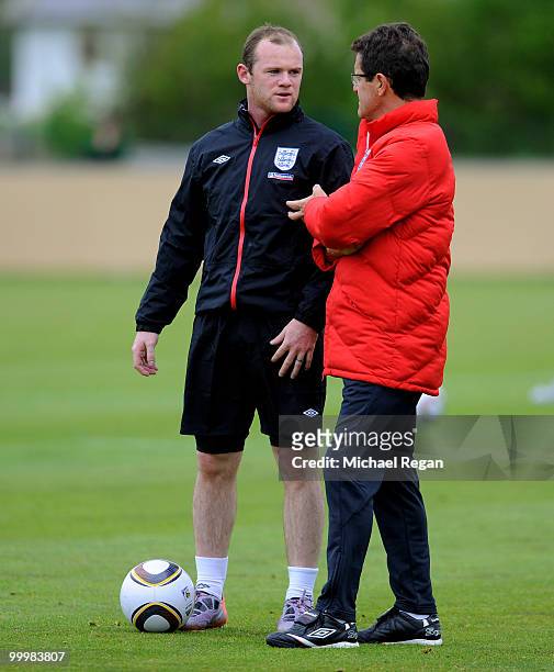 Wayne Rooney speaks to Fabio Capello during an England training session on May 19, 2010 in Irdning, Austria.