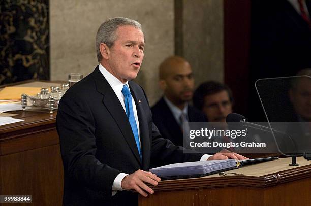 President George W. Bush addresses the U.S. Congress during his State of the Union address at the U.S. Capitol building in Washington on January 28,...