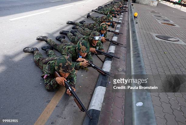 Thai soldiers start the early morning attack on the red shirt camp May 19, 2010 in Bangkok, Thailand. At least 5 people are reported to have died as...