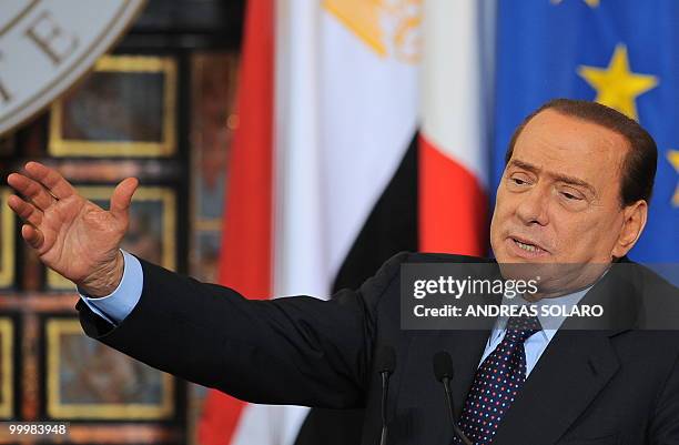 Italian Prime Minister Silvio Berlusconi speaks during a joint press conference with Egyptian President Hosni Mubarak following an Egyptian-Italian...