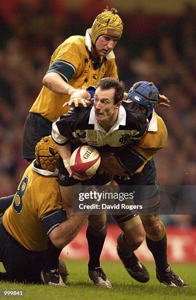 Rob Howley of the Barbarians is stopped by the Australian defence during the Scottish Amicable Challenge match between the Barbarians and Australia...