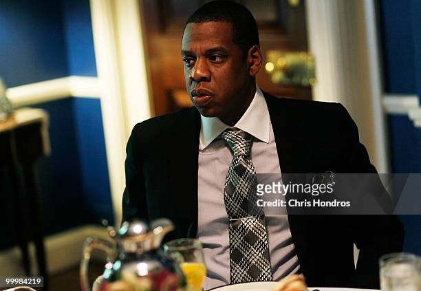 Rapper and New Jersey Nets basketball team co-owner Shawn "Jay-Z" Carter attends a breakfast meeting with New York City Mayor Michael Bloomberg at...