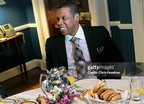 Rapper and New Jersey Nets basketball team co-owner Shawn "Jay-Z" Carter attends a breakfast meeting with New York City Mayor Michael Bloomberg at...