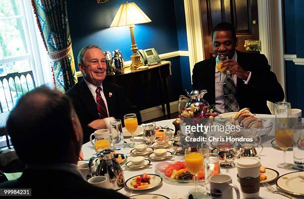 New York City Mayor Michael Bloomberg , rapper and New Jersey Nets basketball team co-owner Shawn "Jay-Z" Carter , and developer Bruce Ratner sit...