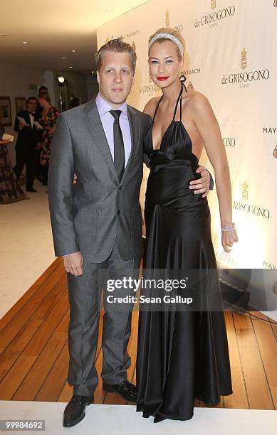 Sandy Meyer-Woelden and Oliver Pocher attend the Cheryl Cole performance at the de Grisogono Party at the Hotel Du Cap on May 18, 2010 in Cap...