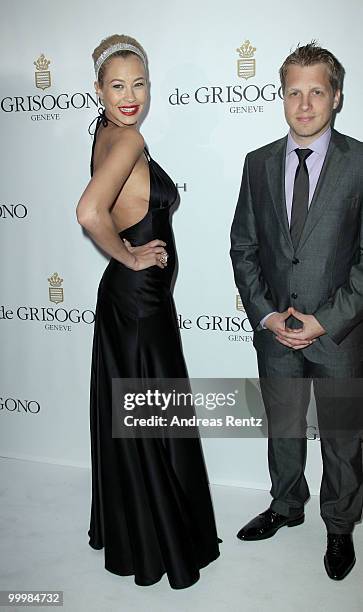 Sandy Meyer-Woelden and Oliver Pocher attend the Cheryl Cole performance at the de Grisogono Party at the Hotel Du Cap on May 18, 2010 in Cap...