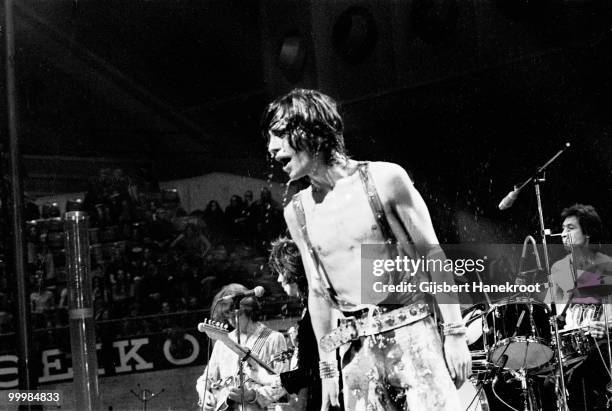 Mick Jagger from The Rolling Stones performs live on stage at Ahoy in Rotterdam, Netherlands on October 13 1973. Charlie Watts behind on drums