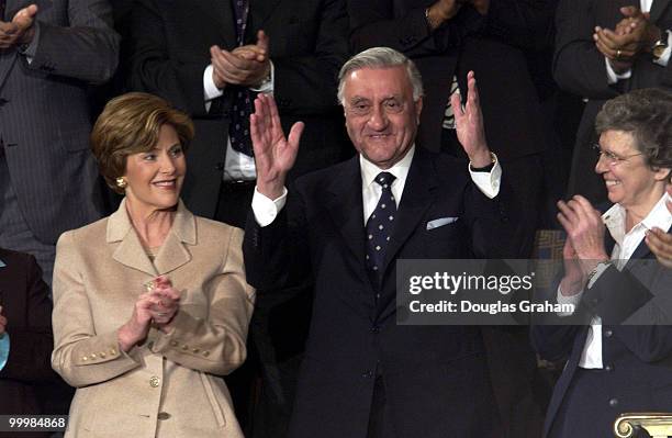 Frist Lady Laura Bush, Iraqi Governing Council chief Adnan Pachachi and Sister Carol Keehan stand as the President introduces them during the State...