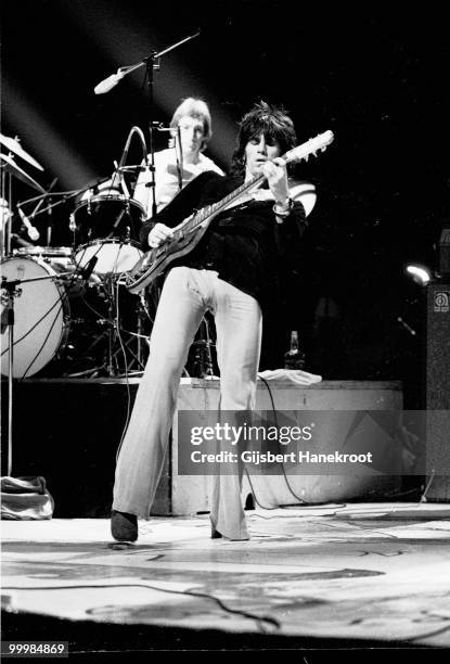 Keith Richards from The Rolling Stones performs live at Ahoy in Rotterdam, Netherlands on October 13 1973. Charlie Watts behind on drums