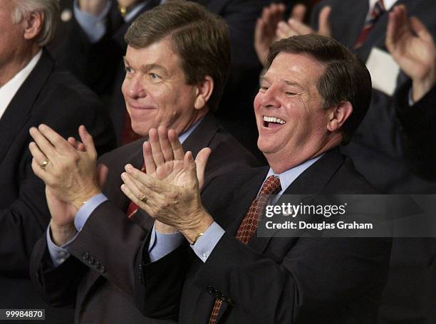 Roy Blunt, R-MO., and Tom Delay, R-TX., enjoy the President State of the Union address.
