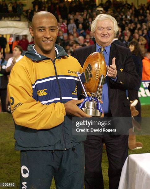 Captain George Gregan of Australia with Scottish Amicable challenge trophy during the Scottish Amicable Challenge match between the Barbarians and...