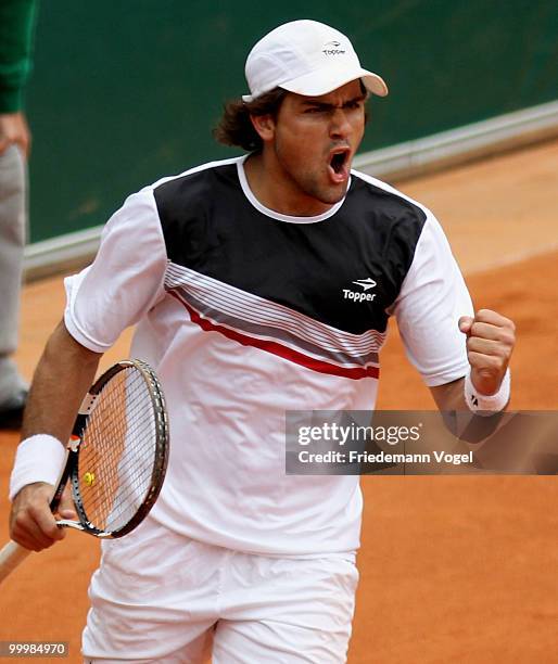 Eduardo Schwank of Argentina celebrates after winning his match against Andreas Beck of Germany during day four of the ARAG World Team Cup at the...