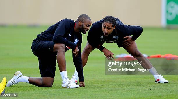 Darren Bent talks to Glen Johnson during an England training session on May 19, 2010 in Irdning, Austria.