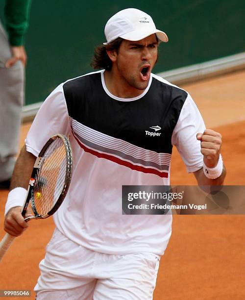 Eduardo Schwank of Argentina celebrates after winning his match against Andreas Beck of Germany during day four of the ARAG World Team Cup at the...