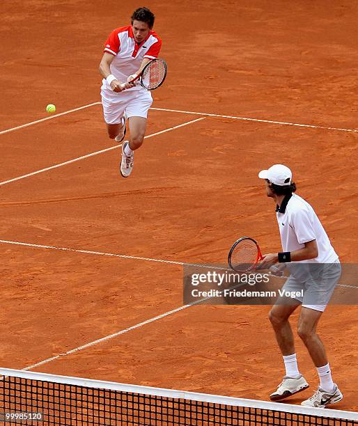 Jeremy Chardy and Nicolas Mahut of France in action during their double match against Viktor Troicki and Nenad Zimonjic of Serbia during day four of...