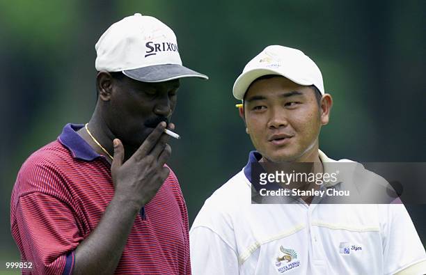 Gunasegaran and Danny Yap of Malaysia having a discussion at the 18th Hole during the Second Round of the Foursome Stroke Play during the Davidoff...