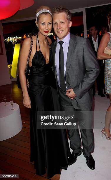 Sandy Meyer-Woelden and Oliver Pocher attend the de Grisogono Cocktail Party at the Hotel Du Cap on May 18, 2010 in Cap D'Antibes, France.