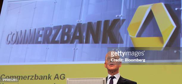 Martin Blessing, chief executive officer of Commerzbank AG, pauses during the company's annual general shareholders' meeting in Frankfurt, Germany,...