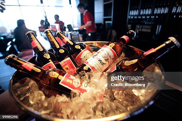 Bottles of Budweiser beer sit on ice during a press conference in Moscow, Russia, on Wednesday, May 19, 2010. Anheuser-Busch InBev NV, the world's...