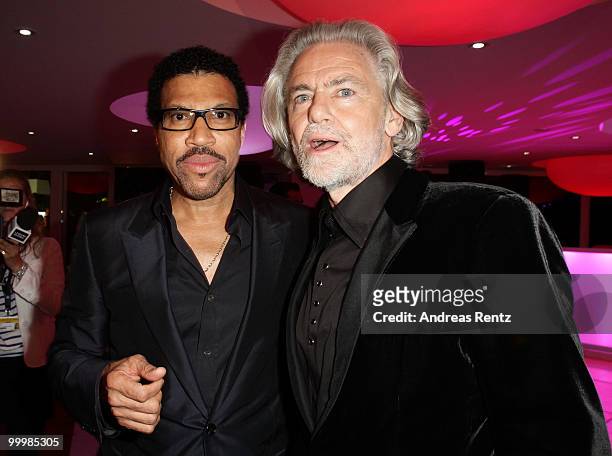 Lionel Richie and Hermann Buehlbecker attend the de Grisogono cocktail party at the Hotel Du Cap on May 18, 2010 in Cap D'Antibes, France.
