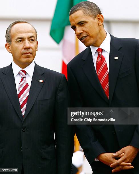 President Barack Obama welcomes Mexican President Felipe Calderon for an official state visit during a ceremony on the South Lawn of the White House...