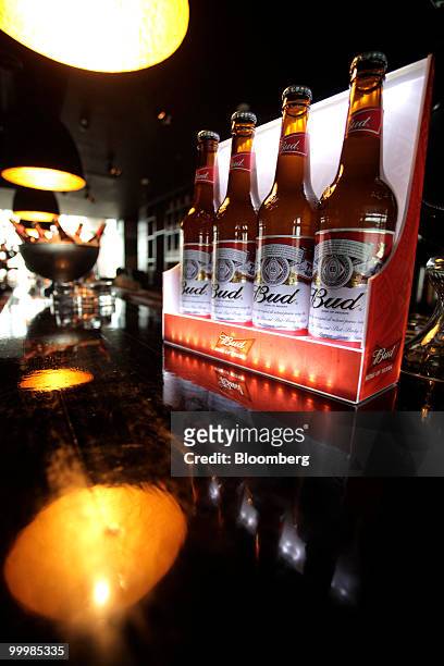 Bottles of Budweiser sit on a bar during a press conference in Moscow, Russia, on Wednesday, May 19, 2010. Anheuser-Busch InBev NV, the world�s...