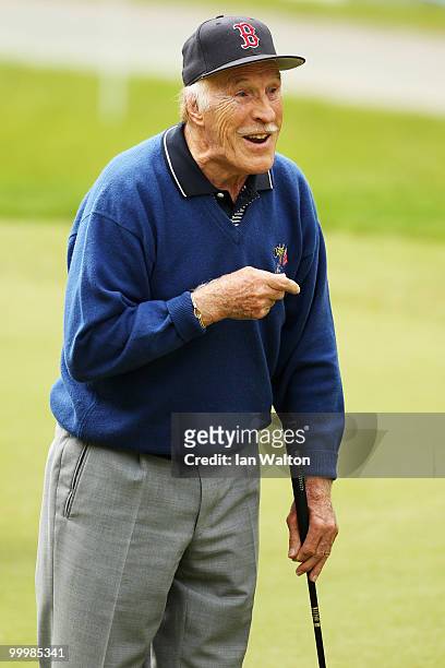 Entertainer Bruce Forsyth reacts to a shot during the Pro-Am round prior to the BMW PGA Championship on the West Course at Wentworth on May 19, 2010...