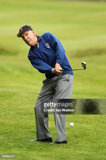 Entertainer Bruce Forsyth plays a shot during the Pro-Am round prior to the BMW PGA Championship on the West Course at Wentworth on May 19, 2010 in...