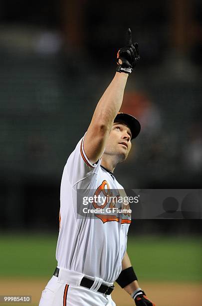 Luke Scott of the Baltimore Orioles celebrates after hitting a home run against the Kansas City Royals at Camden Yards on May 18, 2010 in Baltimore,...