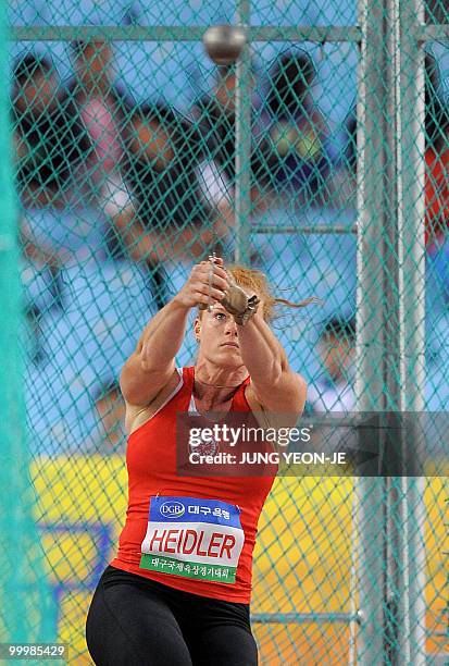 Betty Heidler of Germany competes in the women's hammer throw event of the Daegu Pre-Championships Meeting in Daegu, southeast of Seoul, on May 19,...