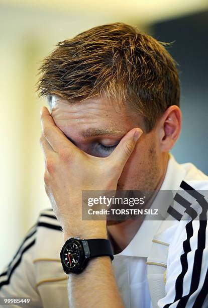 Germany's defender Peer Mertesacker gives an interview during a so-called media day at the Verdura Golf and Spa resort, near Sciacca May 19, 2010....