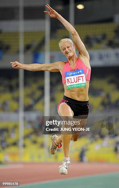 Carolina Kluft of Sweden competes in the women's long jump event of the Daegu Pre-Championships Meeting in Daegu, southeast of Seoul, on May 19,...