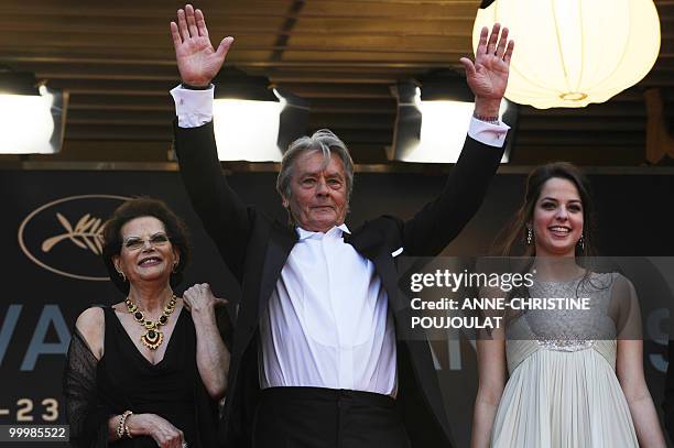 Italian actress Claudia Cardinale , French actor Alain Delon and his daughter Anoushka arrive for the screening of "Il Gattopardpo" presented during...