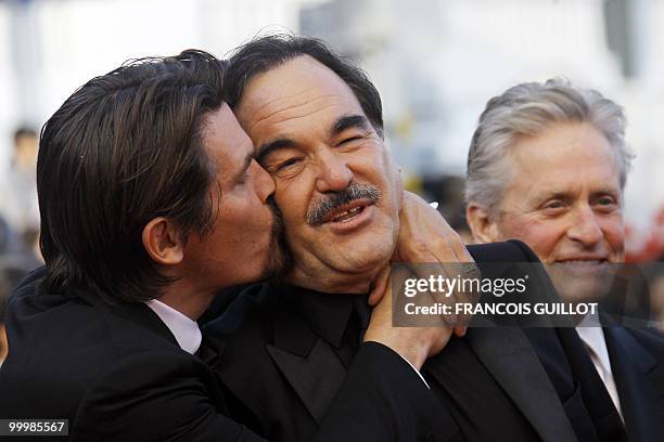 Actor Josh Brolin, US director Oliver Stone and US actor Michael Douglas arrive for the screening of "Wall Street - Money Never Sleeps" presented out...