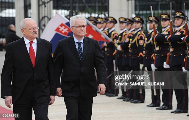 Croatian President, Ivo Josipovic and Slovak President Ivan Gasparovic inspect the honour guards before their meeting in Bratislava on May 19, 2010....