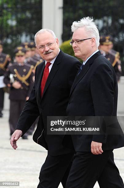 Croatian President, Ivo Josipovic and Slovak President Ivan Gasparovic inspect the honour guards before their meeting in Bratislava on May 19, 2010....