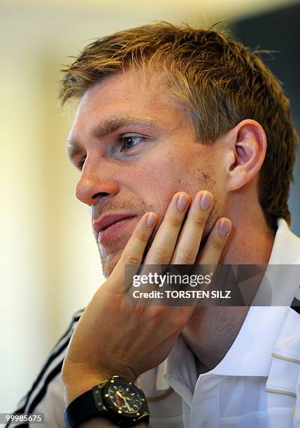 Germany's defender Peer Mertesacker gives an interview during a so-called media day at the Verdura Golf and Spa resort, near Sciacca May 19, 2010....