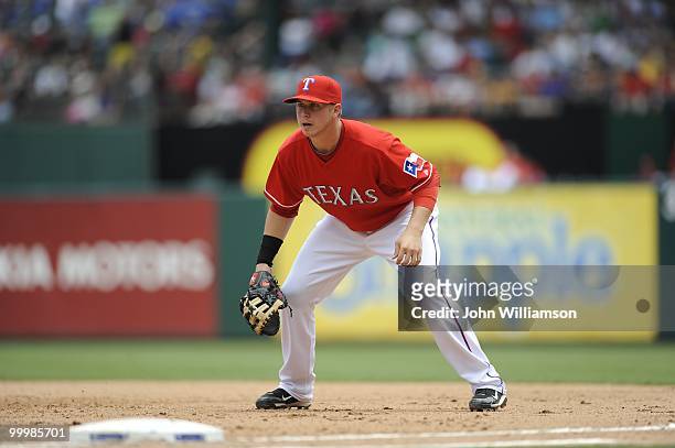 First baseman Justin Smoak of the Texas Rangers looks to home plate for the pitch from his position in the field during the game against the Oakland...
