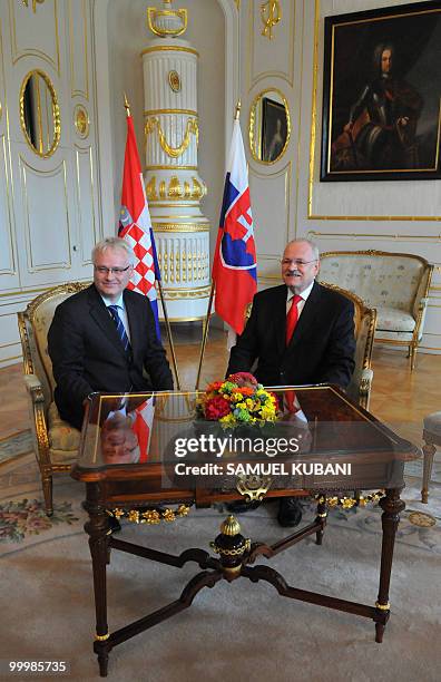 Croatian President, Ivo Josipovic poses with Slovakian President Ivan Gasparovic during their meeting in Bratislava on May 19, 2010. Josipovic...
