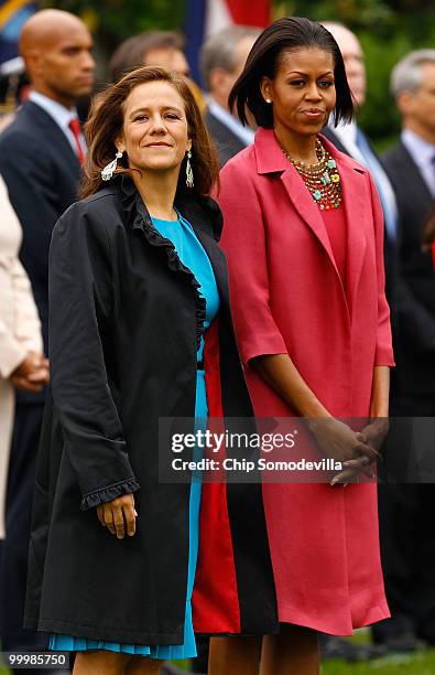 First lady Michelle Obama and Mexican first lady Margarita Zavala take their places during a welcoming ceremony on the South Lawn of the White House...