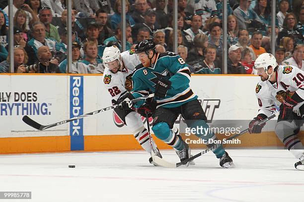Joe Pavelski of the San Jose Sharks battles for the puck in Game One of the Western Conference Finals during the 2010 NHL Stanley Cup Playoffs...