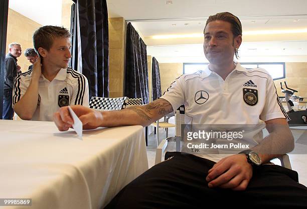 Marko Marin and Tim Wiese of Germany talk to the media during a press conference at Verdura Golf and Spa Resort on May 19, 2010 in Sciacca, Italy.