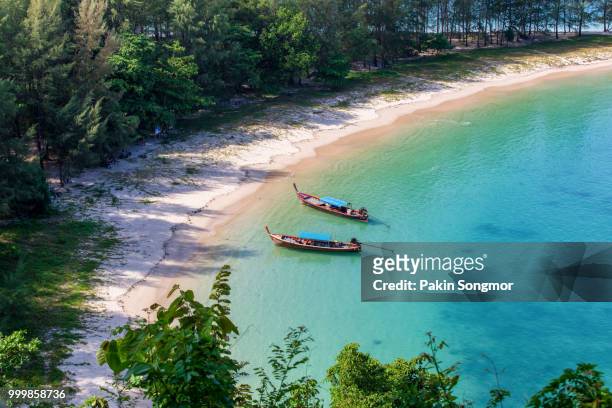 longtail boat at khang khao island (bat island) - similan islands stock pictures, royalty-free photos & images