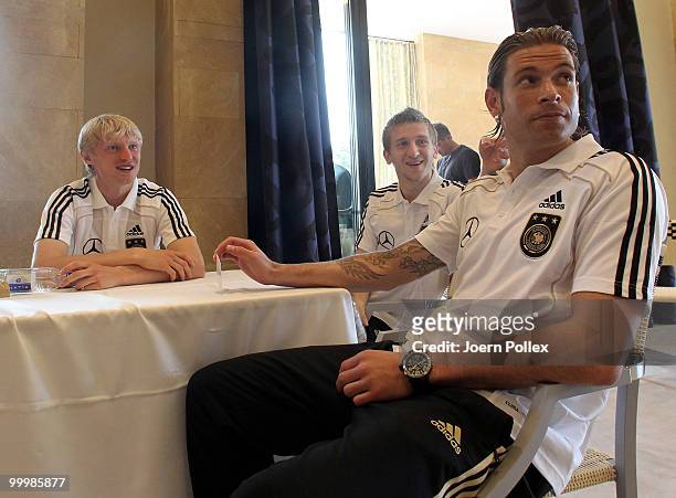 Andreas Beck, Marko Marin and Tim Wiese of Germany talk to the media during a press conference at Verdura Golf and Spa Resort on May 19, 2010 in...