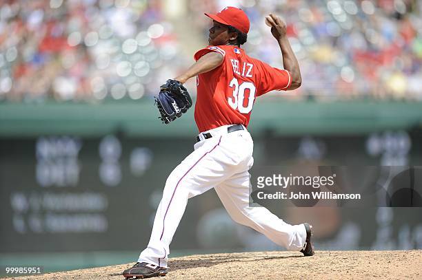 Neftali Feliz of the Texas Rangers pitches during the game against the Oakland Athletics at Rangers Ballpark in Arlington in Arlington, Texas on...