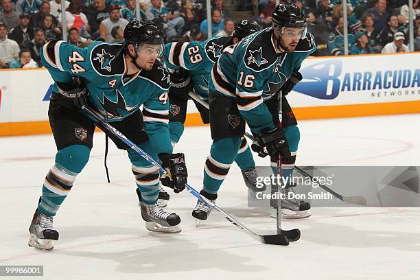 Marc-Edouard Vlasic and Devin Setoguchi of the San Jose Sharks on the faceoff in Game One of the Western Conference Finals during the 2010 NHL...