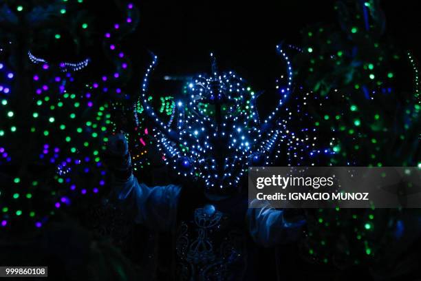 Costumed traditional dancer performs during the religious carnival of "La Tirana", in the town of La Tirana, 78 km east from Iquique in northern...