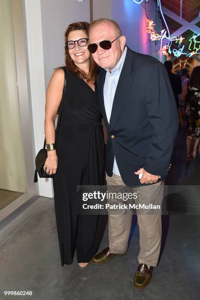 Janet Fernandez and Vinny Fernandez attend the Parrish Art Museum Midsummer Party 2018 at Parrish Art Museum on July 14, 2018 in Water Mill, New York.