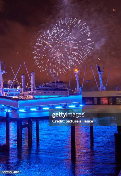 Fireworks light up the night sky during the Hamburg Cruise Days cruise ship festival in Hamburg, Germany, 8 September 2017. Photo: Georg Wendt/dpa