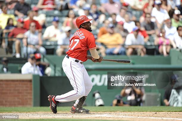 Designated hitter Vladimir Guerrero of the Texas Rangers bats during the game against the Oakland Athletics at Rangers Ballpark in Arlington in...